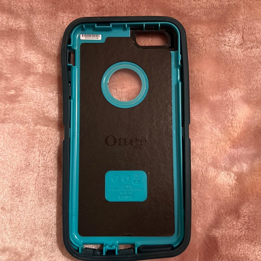 IPhone 7 Plus otter box in teal color. Brand new. Used a few times.